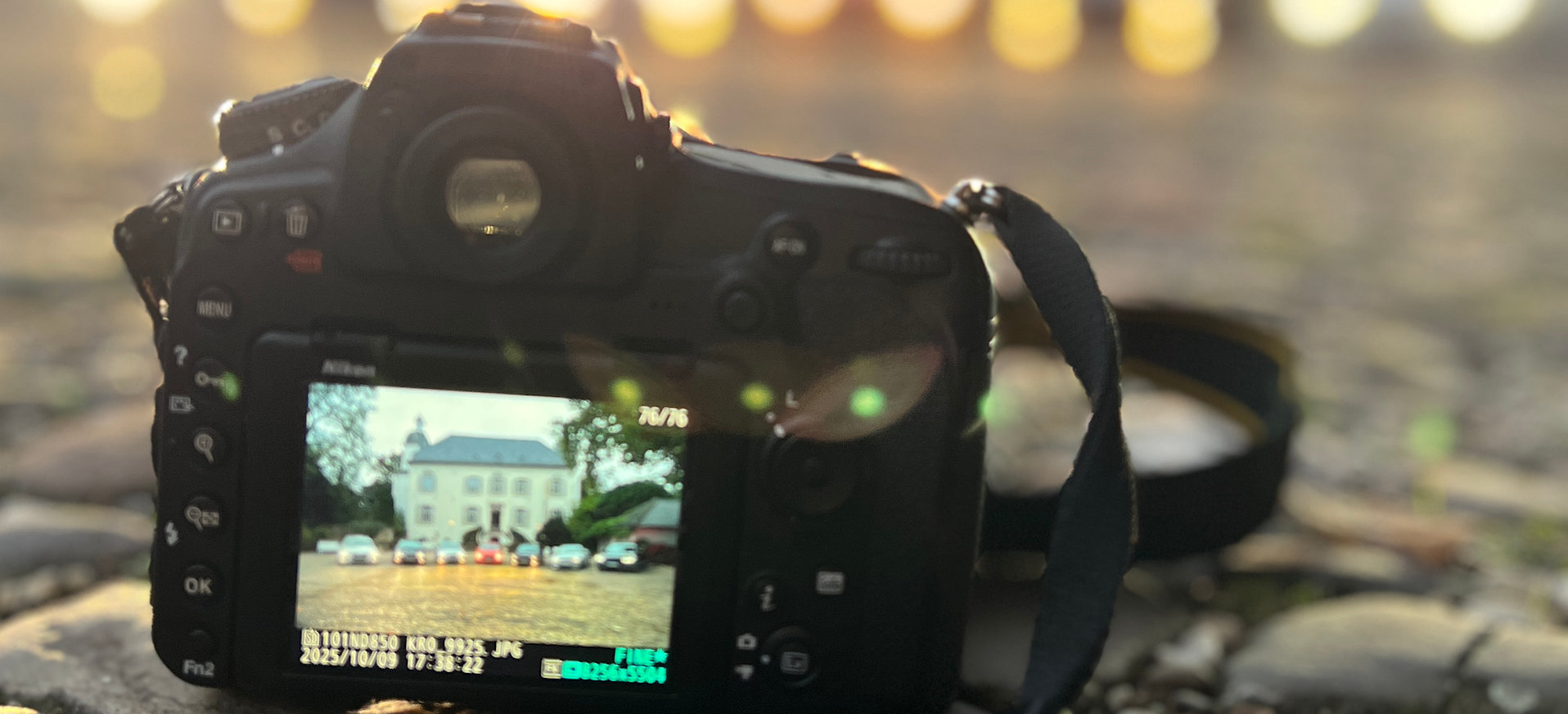 Blick durch die Kamera auf die BMW 3er